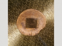 Tanzania (detail), 1995, commemorative plaque mounted on section of mango tree (Brighton Royal Pavilion & Museums, World Art Collection), cut brass wire